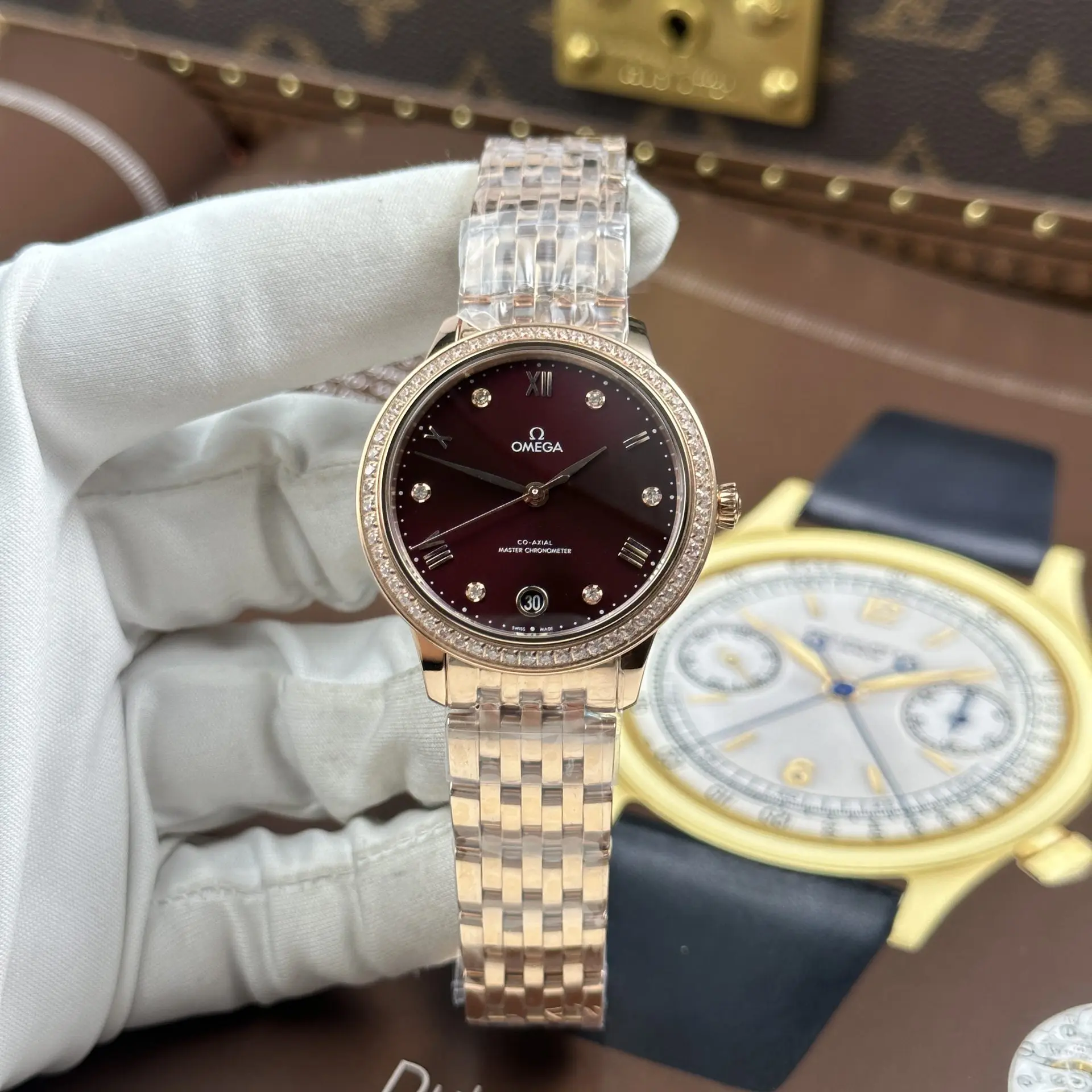 Dong-Ho-Nu-Omega-De-Ville-Prestige-Replica-11-Mat-Mau-Do-Do-May-Co-Thuy-Sy-34mm-1.jpg.webp